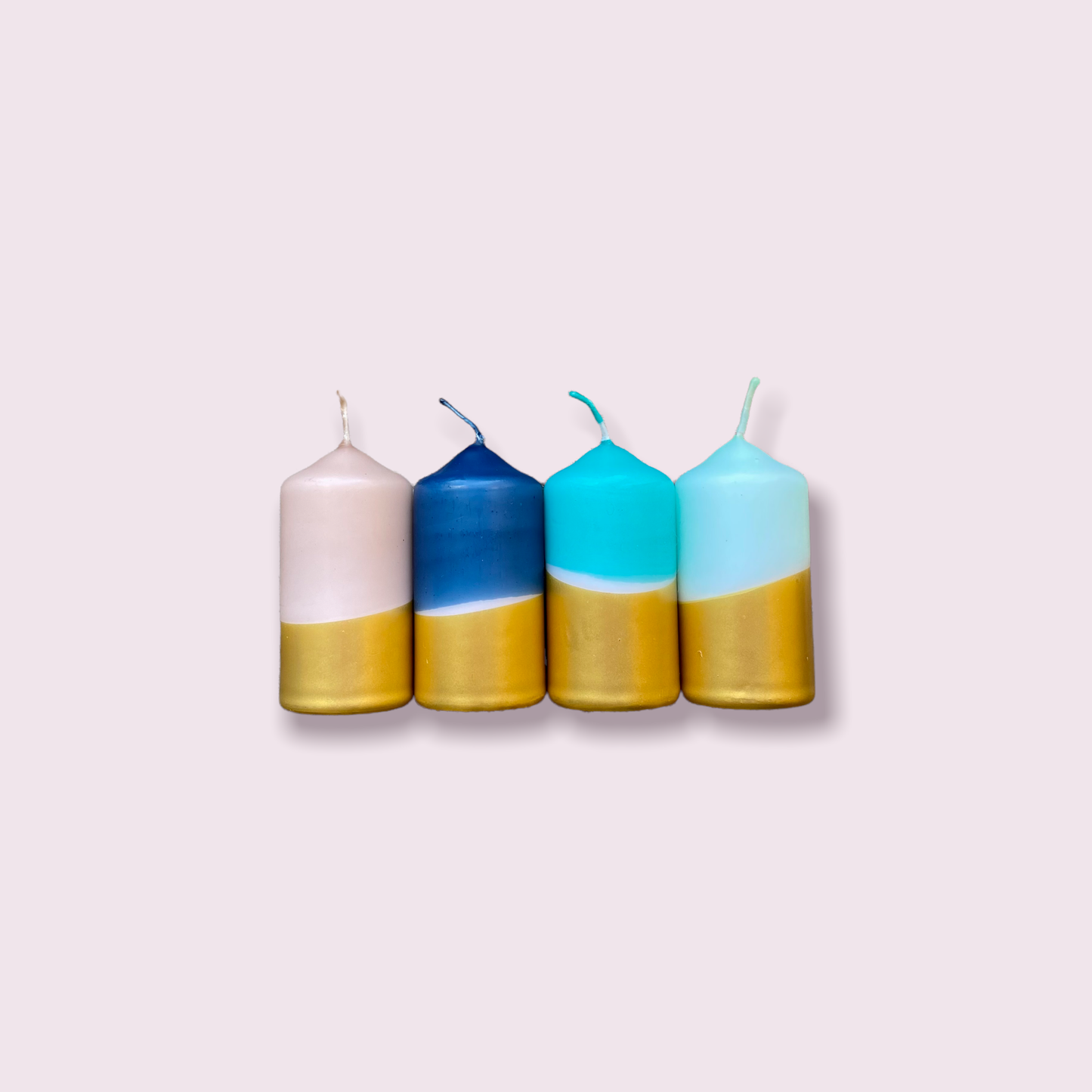 Drei Dip Dye Kerzen